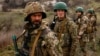 New Ukrainian Army recruits take part in a military exercise in the eastern Donetsk region. “Maybe the Ukrainians will surprise us. They have surprised us since the beginning," one former brigadier general said.