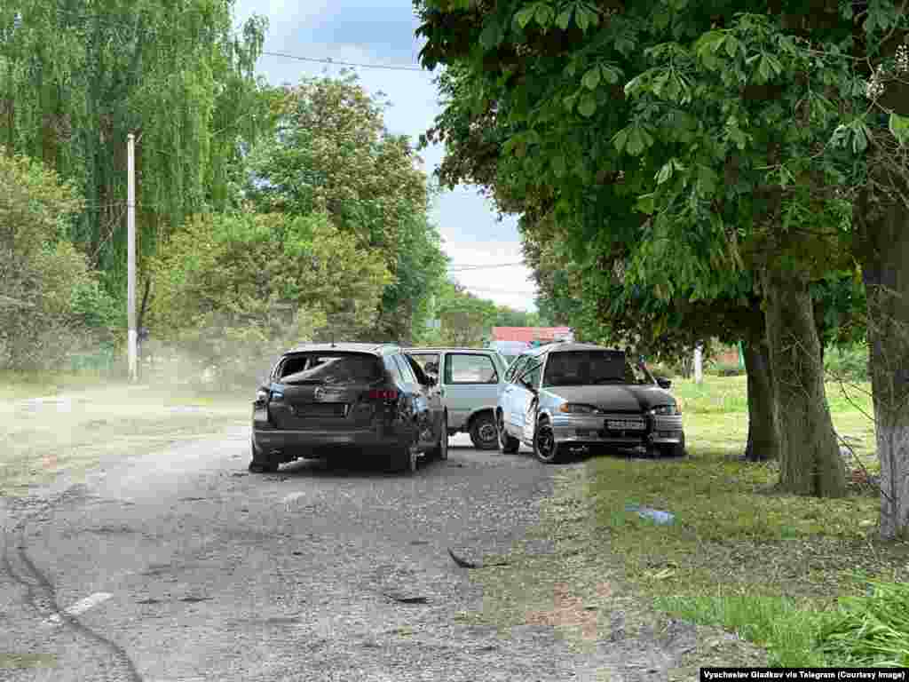 Photos posted to Telegram by Belgorod's Governor Vyacheslav Gladkov on May 23 showed the apparent aftermath of the raid, including these damaged vehicles.  The Russian Defense Ministry on May 23 claimed that its troops had surrounded enemy fighters and used "air strikes, artillery fire, and active action by border units" to push back the forces, killing many of them. Those claims have not been independently confirmed. 
