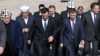 Kyrgyz President Sadyr Japarov (center left) and businessman Khabibula Abdukadyr (center right) attend a ground-laying ceremony for a giant mosque near Bishkek on March 10.