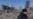 UKRAINE - Ukrainian serviceman secures the site of a bombing at a shopping center, in Kyiv, March 21, 2022