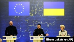Ukrainian President Volodymyr Zelenskiy (center), European Council President Charles Michel (left), and European Commission President Ursula von der Leyen give a joint press conference after a EU-Ukraine summit on February 3 in Kyiv, where the country's efforts to tackle graft were high on the agenda.