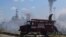 Пожар после российского ракетного удара по порту Одессы, 23 июля 2022 года