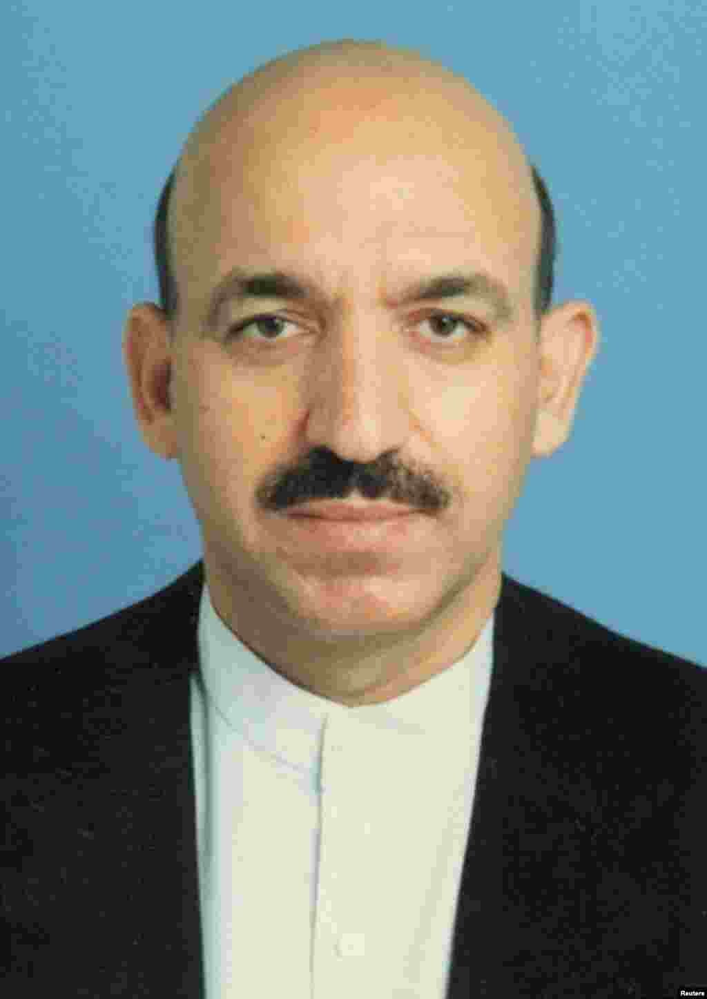 A mustachioed Karzai in a 2001 file photo, shortly before he was named on December 5 of that year as chaiman of the Afghan interim administration during a UN-sponsored conference in Bonn, Germany.