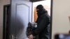 The Minsk offices of the Belarusian Association of Journalists being searched in February.