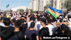 Demonstrators in Nukus "had only flags in their hands. They were just chanting, clapping, cheering," one bystander said.