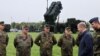 German Chancellor Olaf Scholz meets with members of the Patriot air-defense system unit as he visits the Cologne-Bonn Air Force on October 23.
