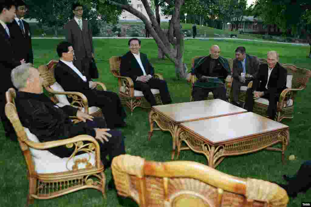 (Seated from left) Kazakh President Nursultan Nazarbaev, Chinese President Hu Jintao, Mongolian President Nambaryn Enkhbayar, Afghan President Hamid Karzai, and Russian President Vladimir Putin during a meeting of the Shanghai Cooperation Organization in Bishkek, Kyrgyzstan, in 2007. Afghanistan and Mongolia are observers of the security and economic bloc. 