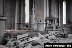 The interior of the 19th-century Holy Savior Cathedral, also known as the Ghazanchetsots Cathedral, after being hit by several artillery rounds