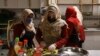Survivors of domestic violence are seen cooking at a restaurant in Kabul established by Mary Akrami, founder of a shelter and a restaurant where women lived and worked. (file photo)