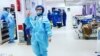 Afghan Doctor Fights On The Front Line Of Iran's Coronavirus Battle