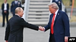 Рускиот претседател Владимир Путин и претседателот на САД Доналд Трамп, август 2025 година