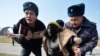 Kyrgyz Supreme Court Rules That Police Crackdown On Women's Rally Was Illegal
