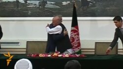 Afghan Rival Candidates Sign Power-Sharing Deal Afghan Rival Candidates Sign Power-Sharing Deal