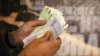 Iran's Currency Plummets To Record Low Against Dollar