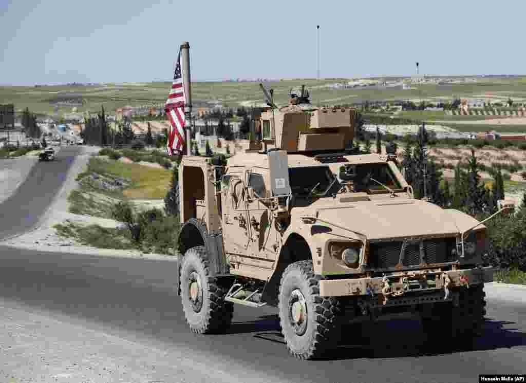 A U.S. vehicle near Manbij in April 2018. On December 19, U.S. President Donald Trump declared it was time for American troops "to come back home." The statement led to a flurry of criticism that the move would embolden IS, with one Republican senator saying a withdrawal would be a mistake, claiming the Islamic State group has been "degraded" but not yet defeated. 