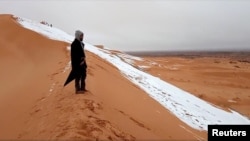 Суровая зима в Алжире. Сахара привыкает не только к рок-музыке