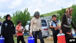 Thousands of Syrian refugees fleeing the unrest in their country have ended up across the border in Turkey. 