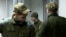 Российский военный Дмитрий Курашов в зале суда в Запорожье