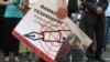 A protest action for press freedom in Kazakhstan in June 2009, highlighting the case of Ramazan Esergepov, a journalist serving three years in prison for revealing state secrets. Rights groups say the case was politically motivated.