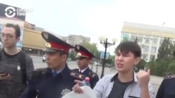 Meta Protest: Kazakh Man Detained Holding Blank Poster Meta Protest: Kazakh Man Detained Holding Blank Poster