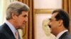 Pakistani Prime Minister Yousuf Raza Gilani (right) shakes hands with U.S. Senator John Kerry during a May 16 meeting in Islamabad
