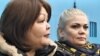 Aiman Omarova (left) believes her dog was killed as a warning. (file photo)