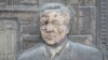 A detail of a public monument in Almaty depicting Kazakhstan's first president, Nursultan Nazarbaev, which was smeared with mud during the recent protests.