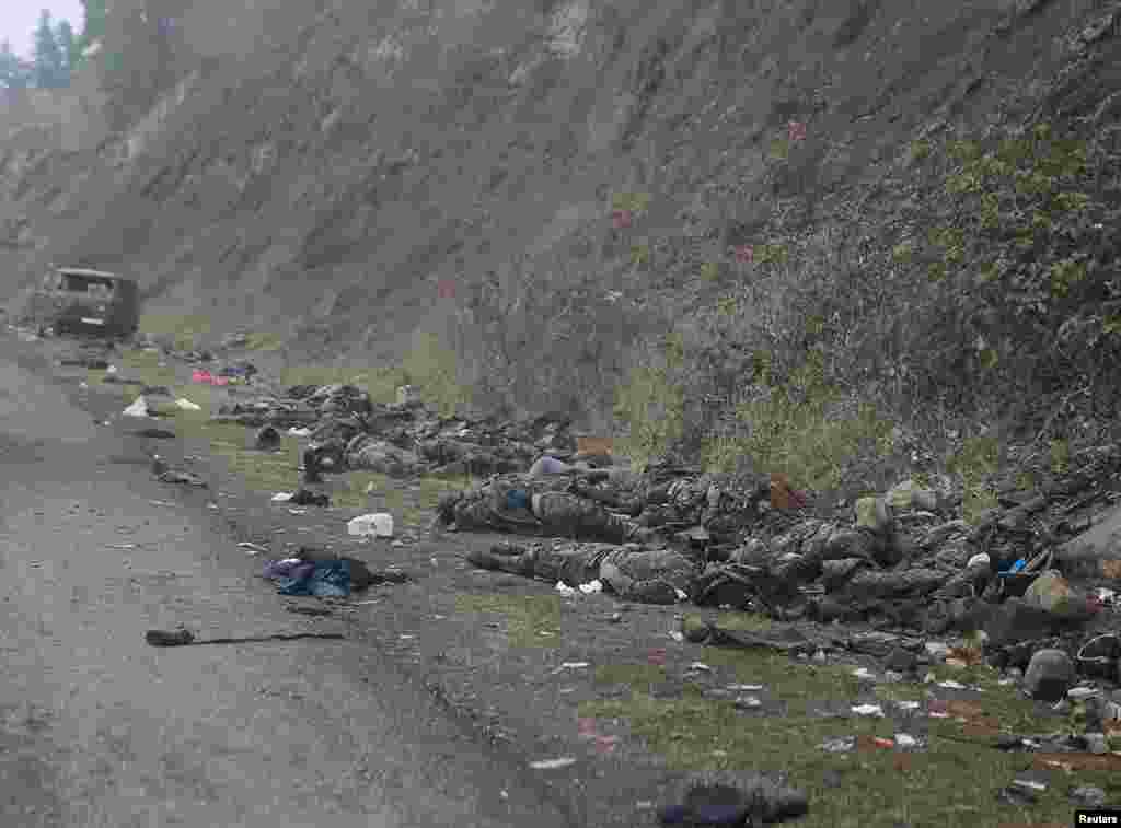 Piles of bodies on the roadside near the town of Shushi/Susa, which was captured by Azerbaijani forces on November 8. RFE/RL was not able to confirm the nationality of the dead fighters in the photographs taken from the convoy. 