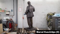 A Vladimir Lenin statue belonging to the Marxist-Leninist Party of Germany stands alone in storage.