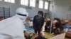 COVID-19: Mirziyoev Reprimands Uzbek Health Minister, Regional Officials Over Efforts To Battle Virus