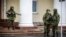 "Зеленые человечки": российские военные в Крыму в начале марта 2014 года