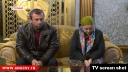 Chechen social worker Ayshat Inayeva (left) and her husband looked very contrite when they had to meet with Ramzan Kadyrov on TV after she had sharply criticized the Caucasus leader.