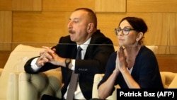 Azerbaijani President Ilham Aliyev (left) and his wife, Vice President Mehriban Aliyeva, attend the taekwondo finals at the Baku 2017 4th Islamic Solidarity Games at the Baku Sports Hall in Baku in May.
