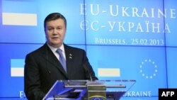 Ukrainian President Viktor Yanukovych is under pressure from Brussels and Moscow, and the camps within Ukraine pulling each way.