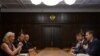 Russian parliament speaker Sergei Naryshkin (front right) meets with France's National Front leader Marine Le Pen (left) in Moscow last week. Analysts say the Kremlin and France's far-right share a similar ideological model based on an aggressive anti-U.S, Euroskeptic attitude. 