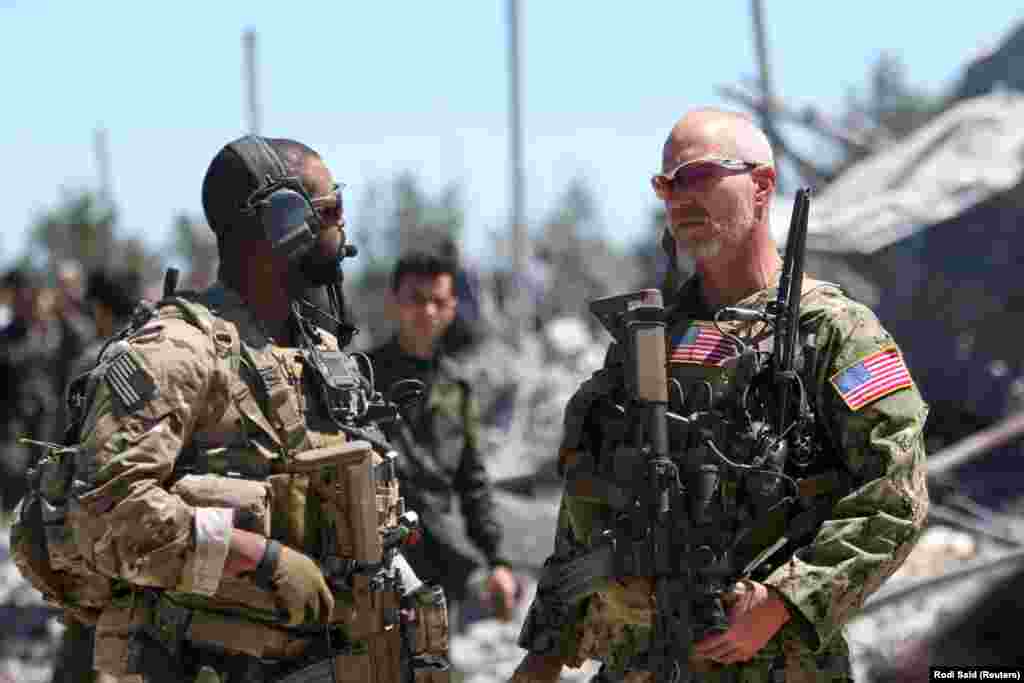 U.S. soldiers inside a YPG base in northeastern Syria in April 2017. Four American service members have been killed since the Syrian operation began, most recently in March 2018 when an American and a British soldier were killed by an explosive. 